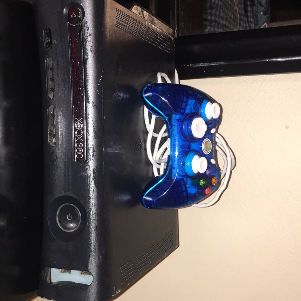 Xbox 360 and controller & And  games downloaded